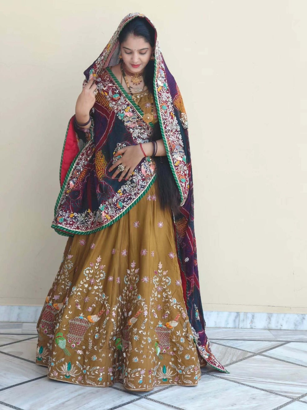 Mustard Folk Embroidery Lehenga | Radhika Boutique