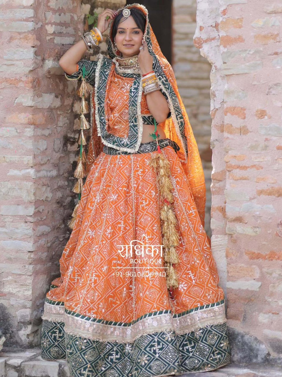 Radhika Boutique Orange Rajasthani Bridal Lehenga | Handcrafted